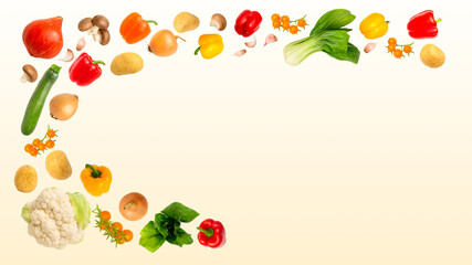 Lots of colorful bright vegetables laid out in half-frame around negative gradient beige space.Healthy food,vegan eating,vegetarian diet concept.Side dish ingredients.Copy space.Grocery store banner