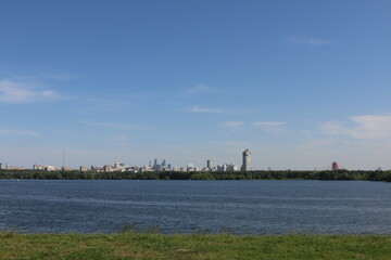 Houses in Strogino on the background of the river, Moscow.