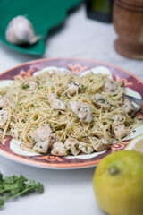 Angel hair pasta dish with chicken lemon parsley 