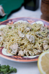 Angel hair pasta dish with chicken lemon parsley 