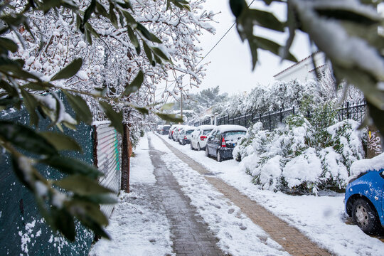 Beautiful winter morning snow covered streets of Athens, Greece, 15th of February 2021.