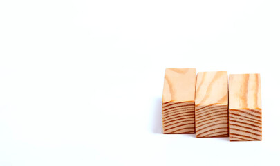 Front view of three wooden blocks on white background