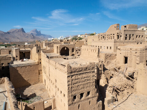 Exterior view of a mostly abandoned mud construction houses in Bait Al Safah, Al Hamra, Sultanate of Oman