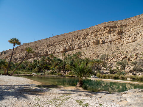 Natural swimming pools formed by flood waters in Wadi Bani Khalid, Sultanate of Oman