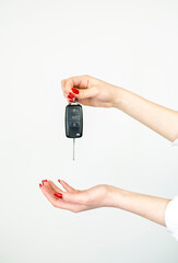 Hand with a car key. Space for your text.