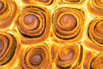 Cinnamon dough bun rolls traditional Danish baked sweet autumn cake holiday dessert swirl bread...