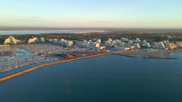 Aerialfly over drone city scape from above La Grande Motte France	