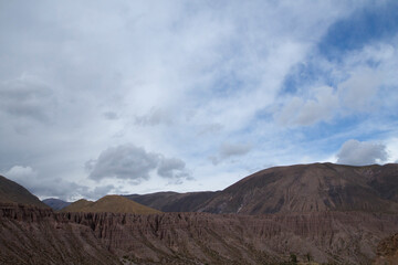 Arid desert landscape. View of the hills, cliffs and sandstone formations.