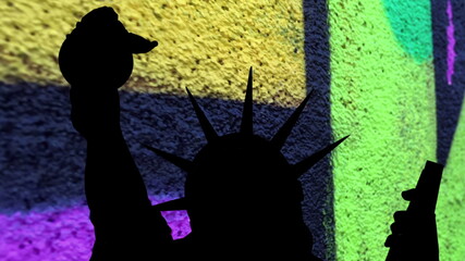 Statue of liberty against colorful background