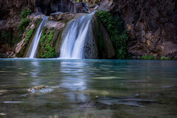 Fototapeta na wymiar Cascadas de agua color azul turquesa, en Comala Jalisco Cerca de Tapalpa pueblo magico