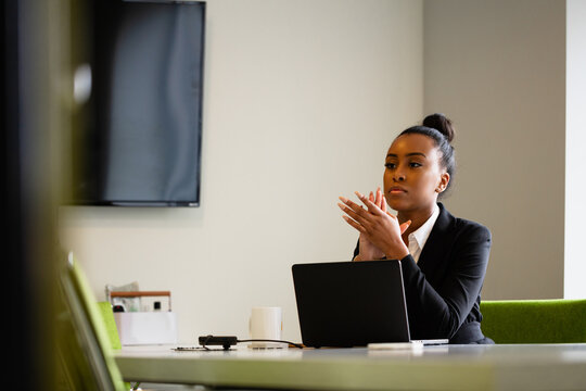Young businesswoman sales consultant chatting in modern business office