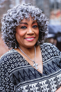 Portrait Of Black Senior Citizen Woman With Grey Hair