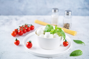 Fresh mozzarella cheese with tomatoes and Basil leaves
