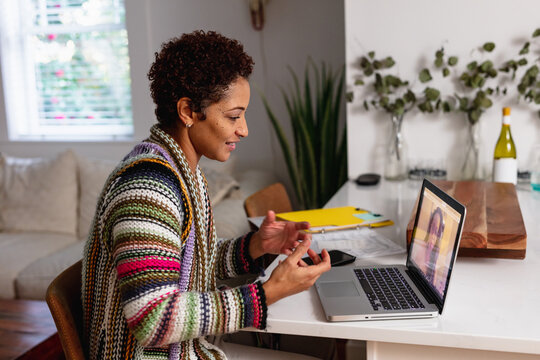 Black woman video chat with client remotely, consultant