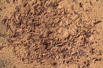 Background food crumb chocolate on a gray stone close-up background of Chocolate Day