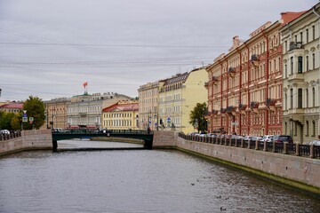 Saint Petersburg, Russia - November 2020 Nevskiy Prospekt (Nevsky Avenue) panorama with historic buildings, architecture and pedestrians. The Tower of Duma and Gostiny Dvor at sunset, Millionaya