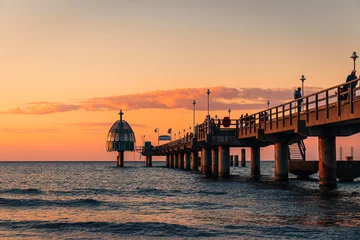 Abendroter Himmel über der Ostsee an der Seebrücke Zinnowitz auf Usedom © Matthias Pens