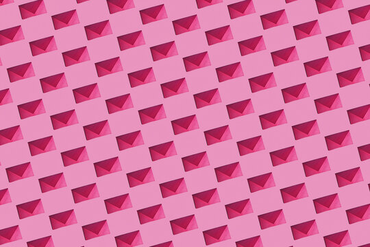Pattern of rows of pink envelopes