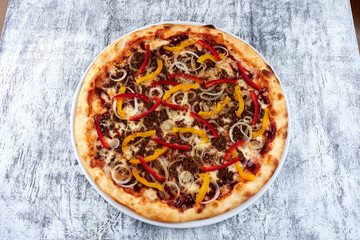 fresh pizza on the white plate