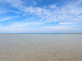 waves on the sand beach, blue water of the Red Sea, Hurgarda, Egypt