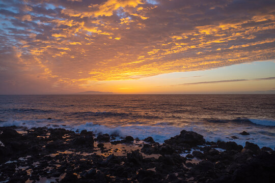 Clouds above sea at sunset