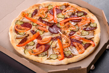 Fresh delicious pizza made in a hearth oven with sausage, pepper and tomatoes