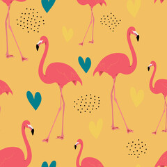 Seamless pattern with exotic pink flamingos on a yellow background. Birds for printing on fabric, textiles, paper, bedding. 