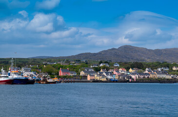 Fototapeta na wymiar View of harbour and otwn of Castletown Bere in the south of Ireland and the mountains at the background.