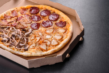 Fresh delicious pizza made in a hearth oven with four types of meat and sausage