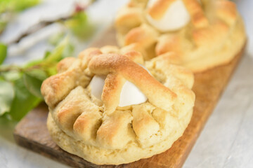 Homemade sweet Italian Easter Bread Rings with eggs called puddica in Puglia