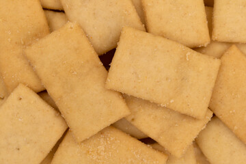 Cheese and garlic snack crackers portion close view.
