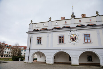 Renaissance town hall with arcades at main Masaryk Square, historical building in city centre, spa resort in winter day, Lazne Bohdanec, Pardubice region, Czech Republic