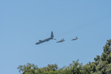 Military airplanes. Independence Day in Israel, a national holiday. Israel Air Force parade in the blue sky