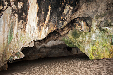 Inside a large cave in limestone crock on the beach. Grotto. Palinuro, Italy