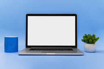 Laptop with Blank White Screen Against Blue Background