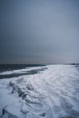 Obraz premium Waves on the beach winter landscape 