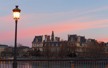 Fototapeta na wymiar View of city hall of Paris at sunrise , France.
