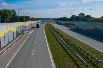 Empty road expressway highway speed truck in distance
