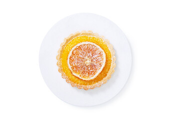 Traditional french lemon tart, top viewTraditional french lemon tart, with orange slice