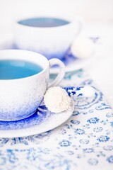 Bllue tea or clitoria flowers drink and coconut candy