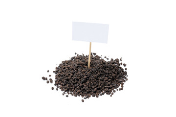 black tea granules isolated on white background. design element. indian beverage tea with price tag cut out