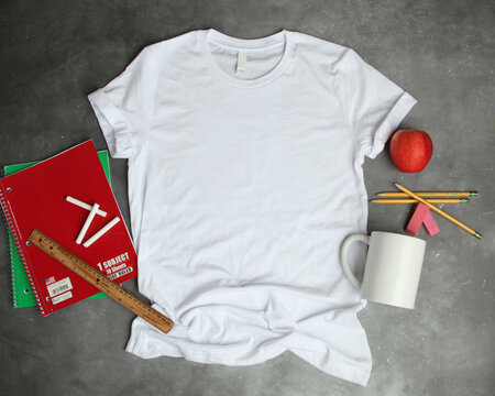 Flat lay mockup of white tee shirt for teacher or school shirt