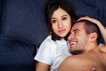 young pretty couple together in bed sleeping chill, lifestyle people concept