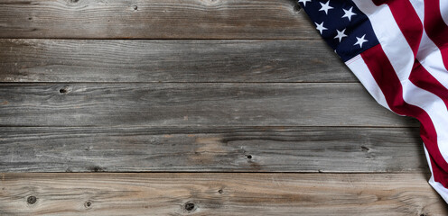 Waving US flag on wood for the holidays of Memorial, 4th of July and Veterans Day