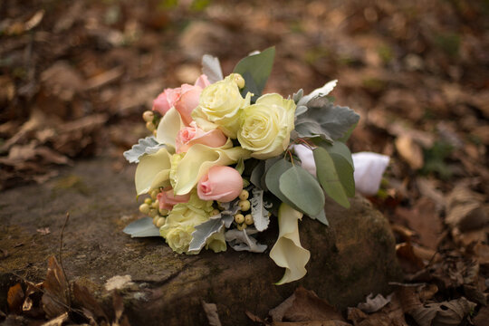 Wedding Photograph Bridal Bouquet White and Pink Roses, Lily, and Dusty Miller Floral Arrangement