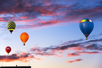 balloon amid blue sky . soar in the clouds