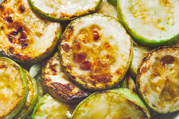 Fried zucchini with garlic . Prepared vegetables