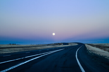Moon rise on the highway