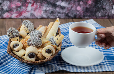 Mix of cookies in the platter served with a cup of earl grey tea