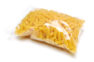 Italian pasta (Gomiti Rigati) on white background